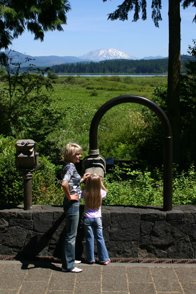 A small child looks at Mt. St. Helens